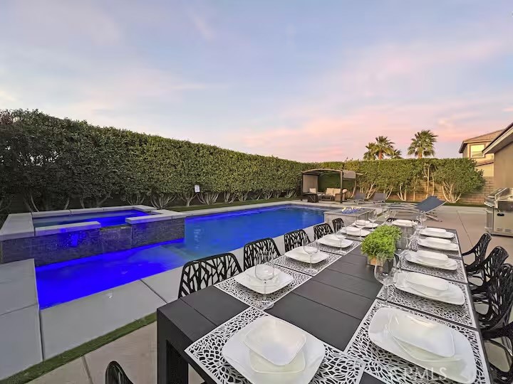 a view of a patio with couches chairs and a table