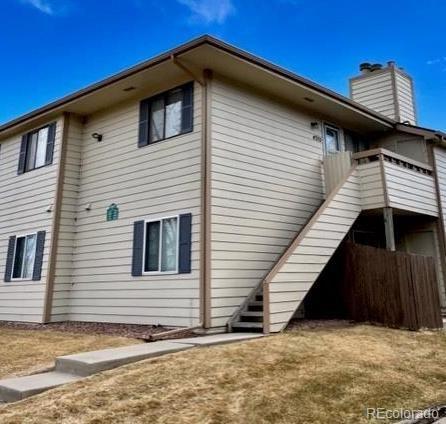 a view of a house with a roof deck