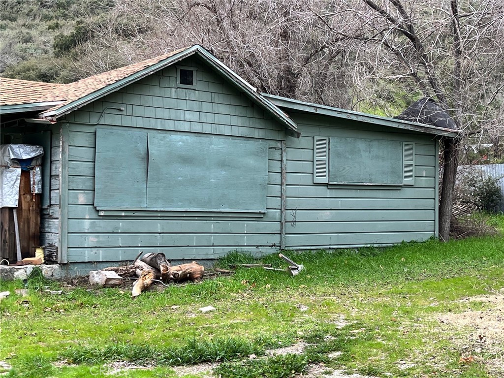 a view of backyard of a house