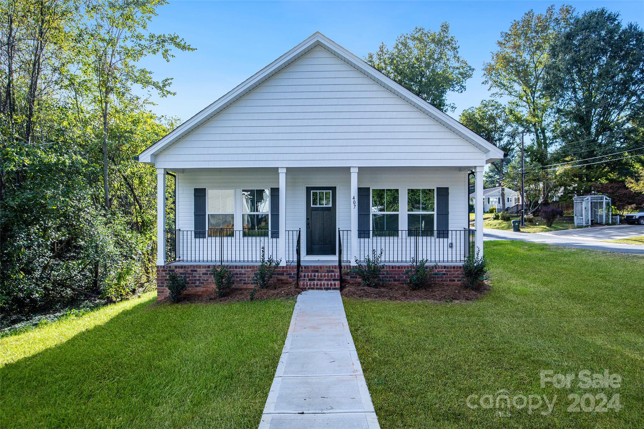 a view of a house that has a garden