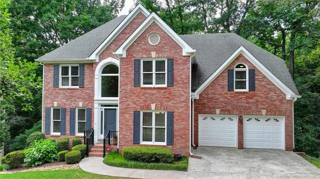 $674,900 | 5595 Ashewoode Downs Drive | Johns Creek