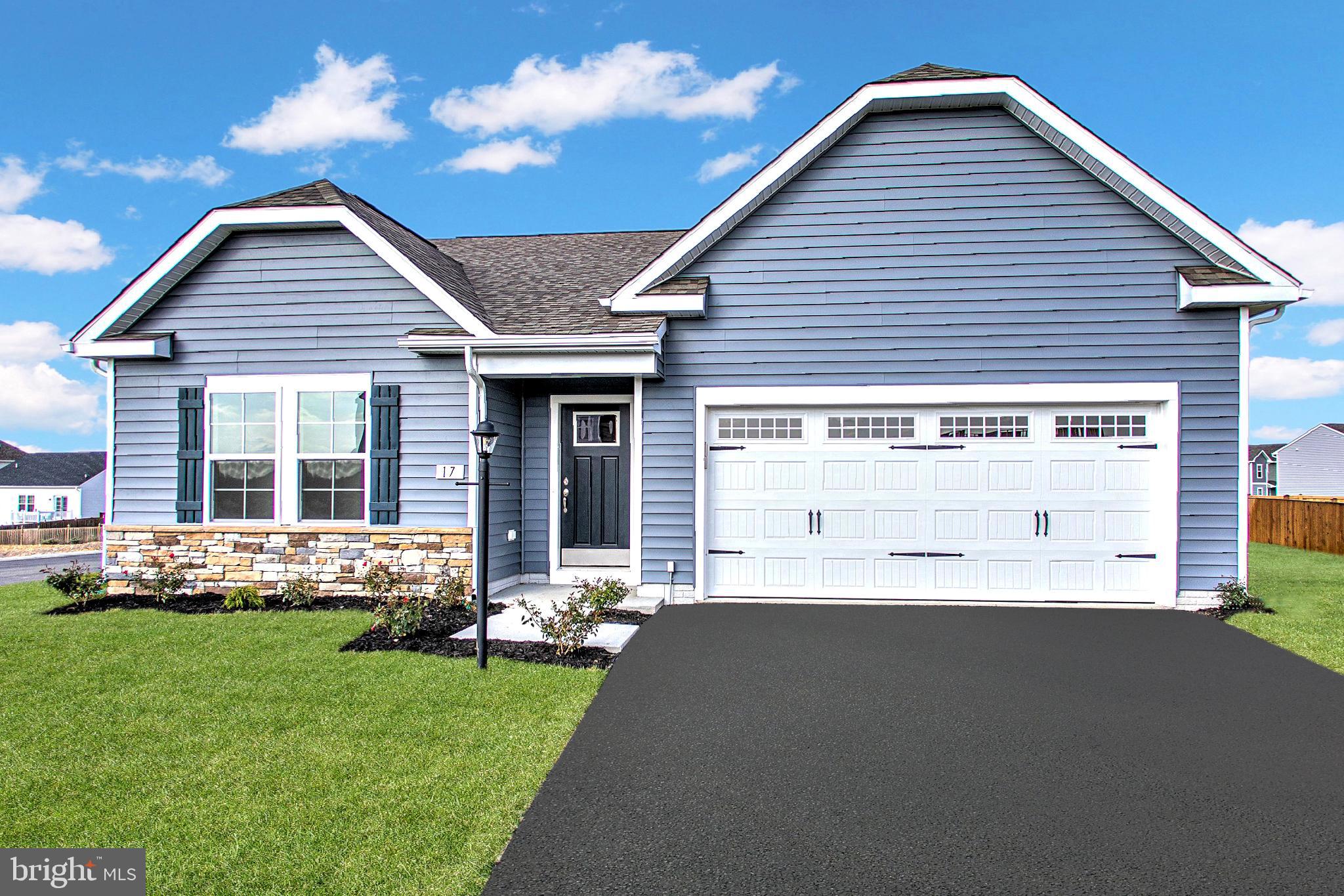 a view of a house with backyard