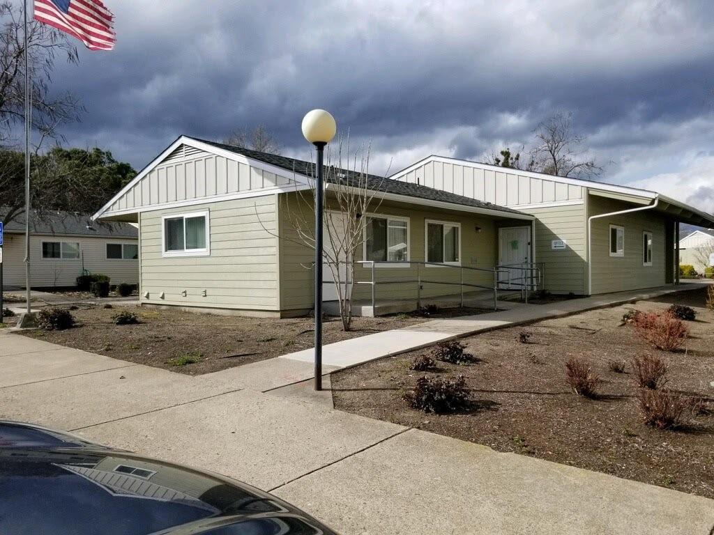 a front view of a house with garage