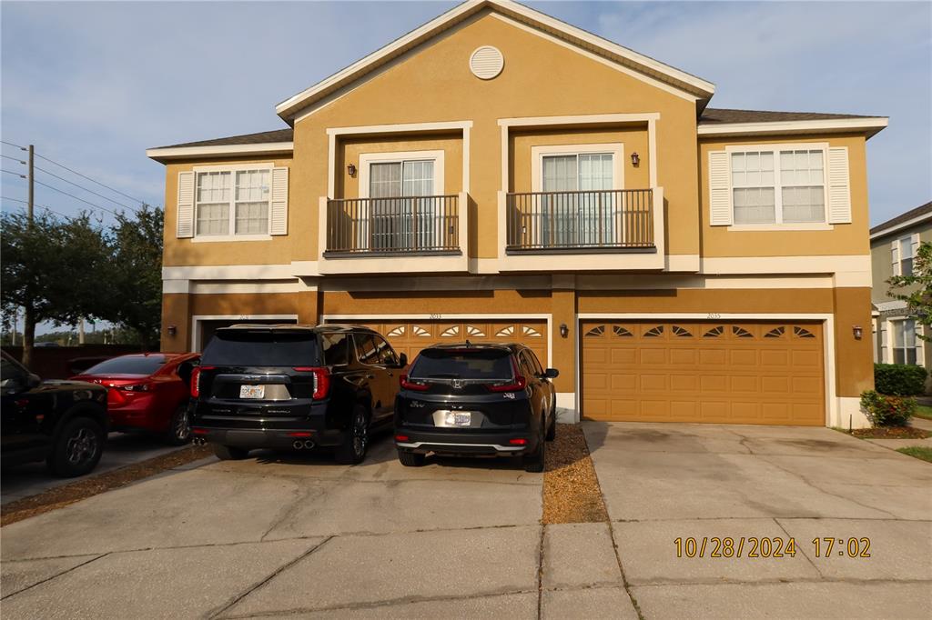 a car parked in front of a house