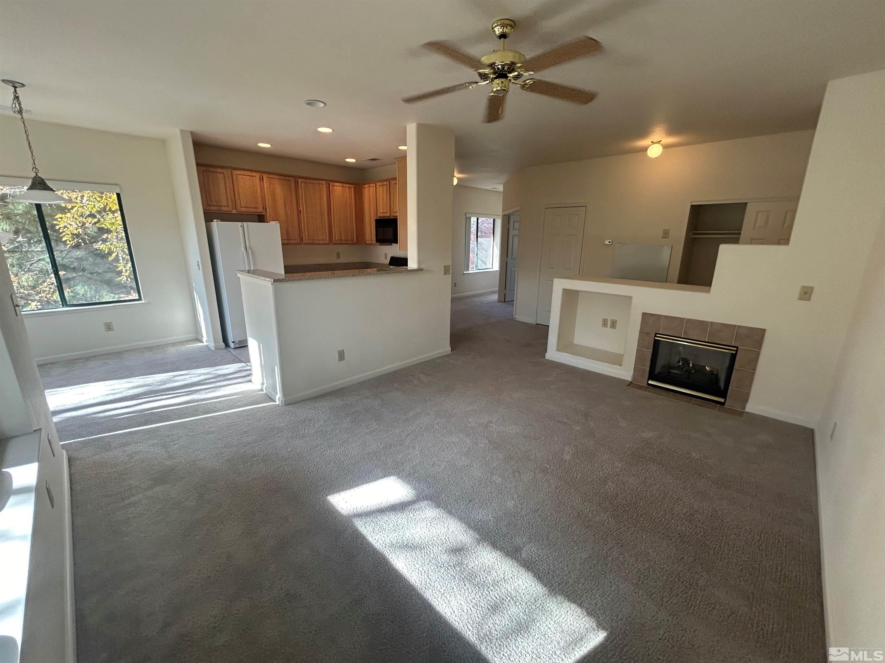 a view of a livingroom with furniture