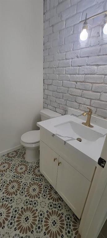 a bathroom with a sink and a toilet