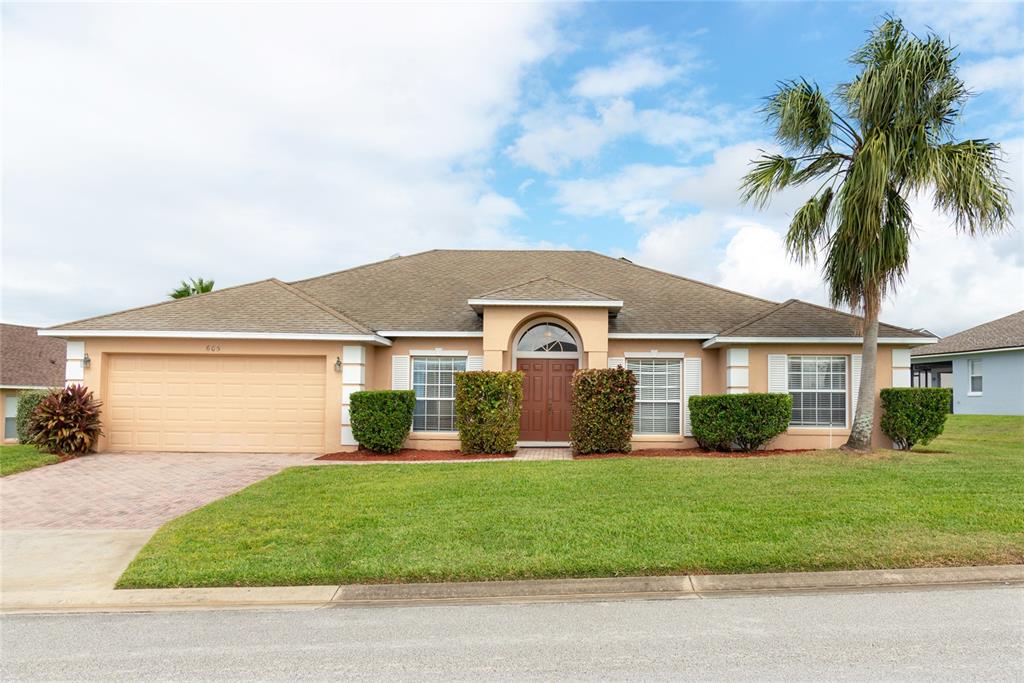 front view of house with a yard