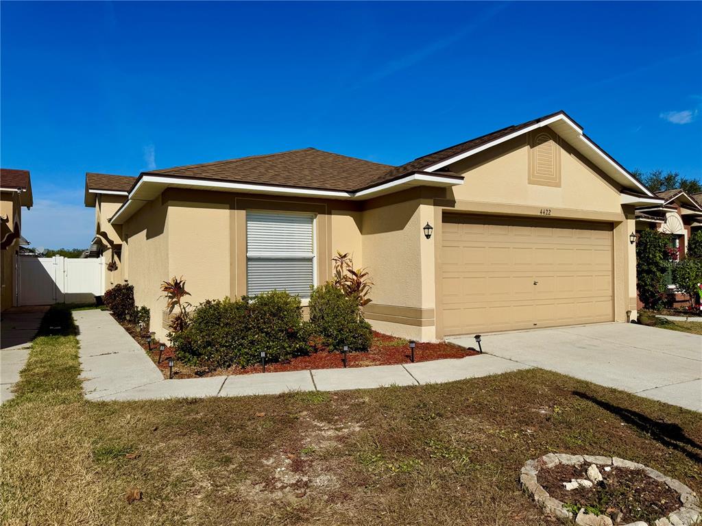 a front view of a house with yard