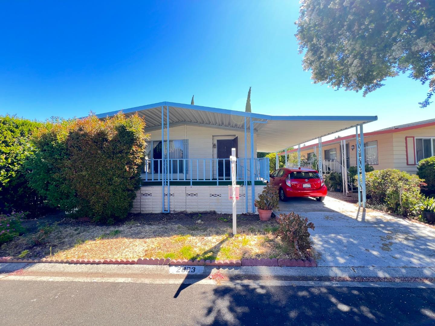 a view of a house with a patio