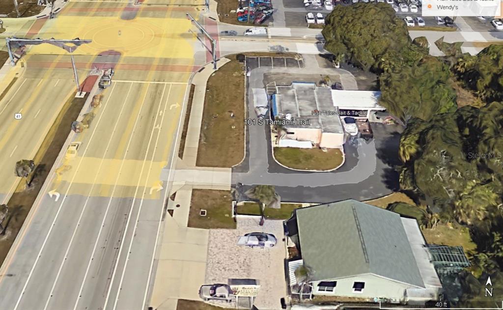 an aerial view of a highlighted house