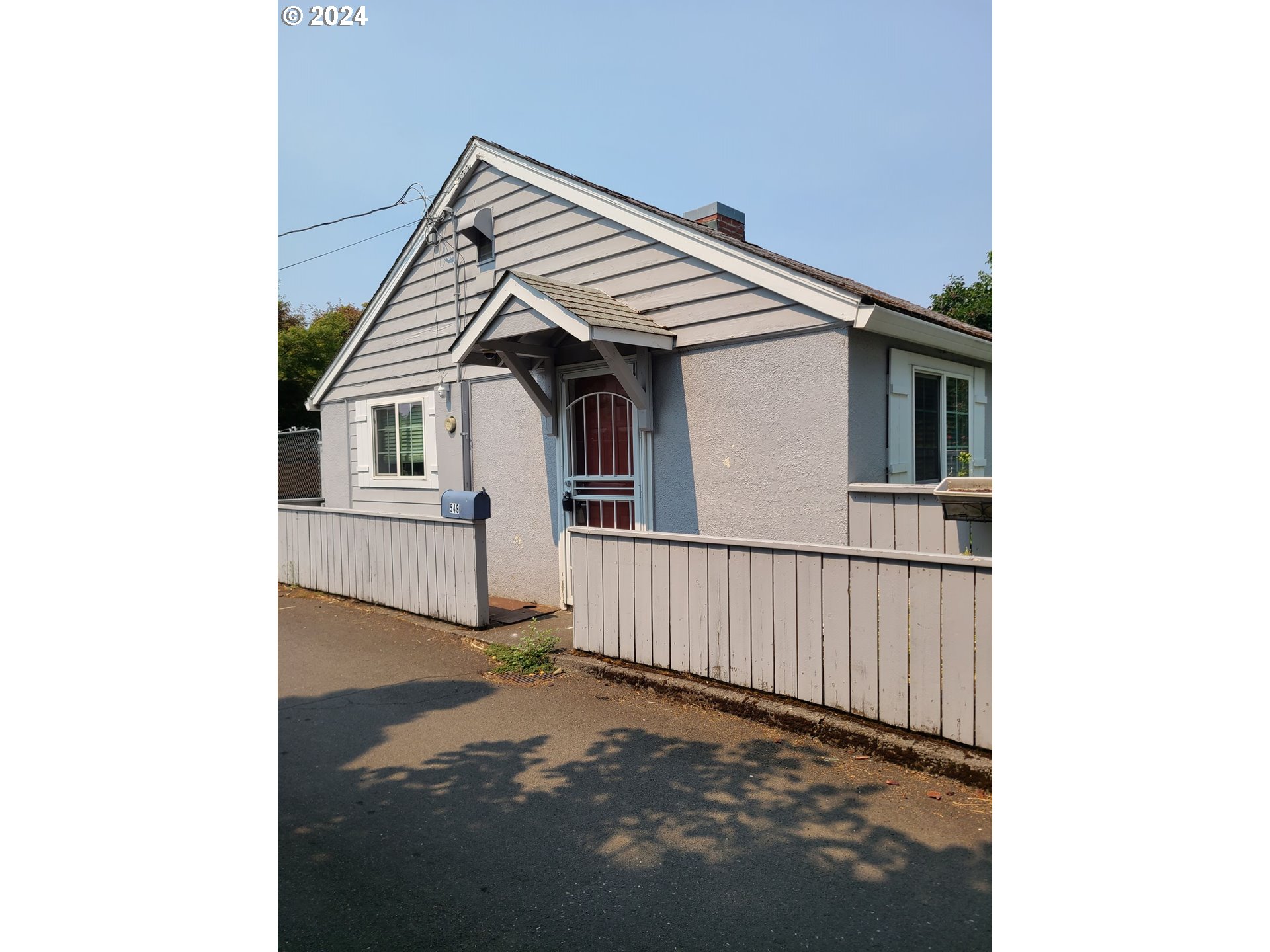 a view of a house with a garage