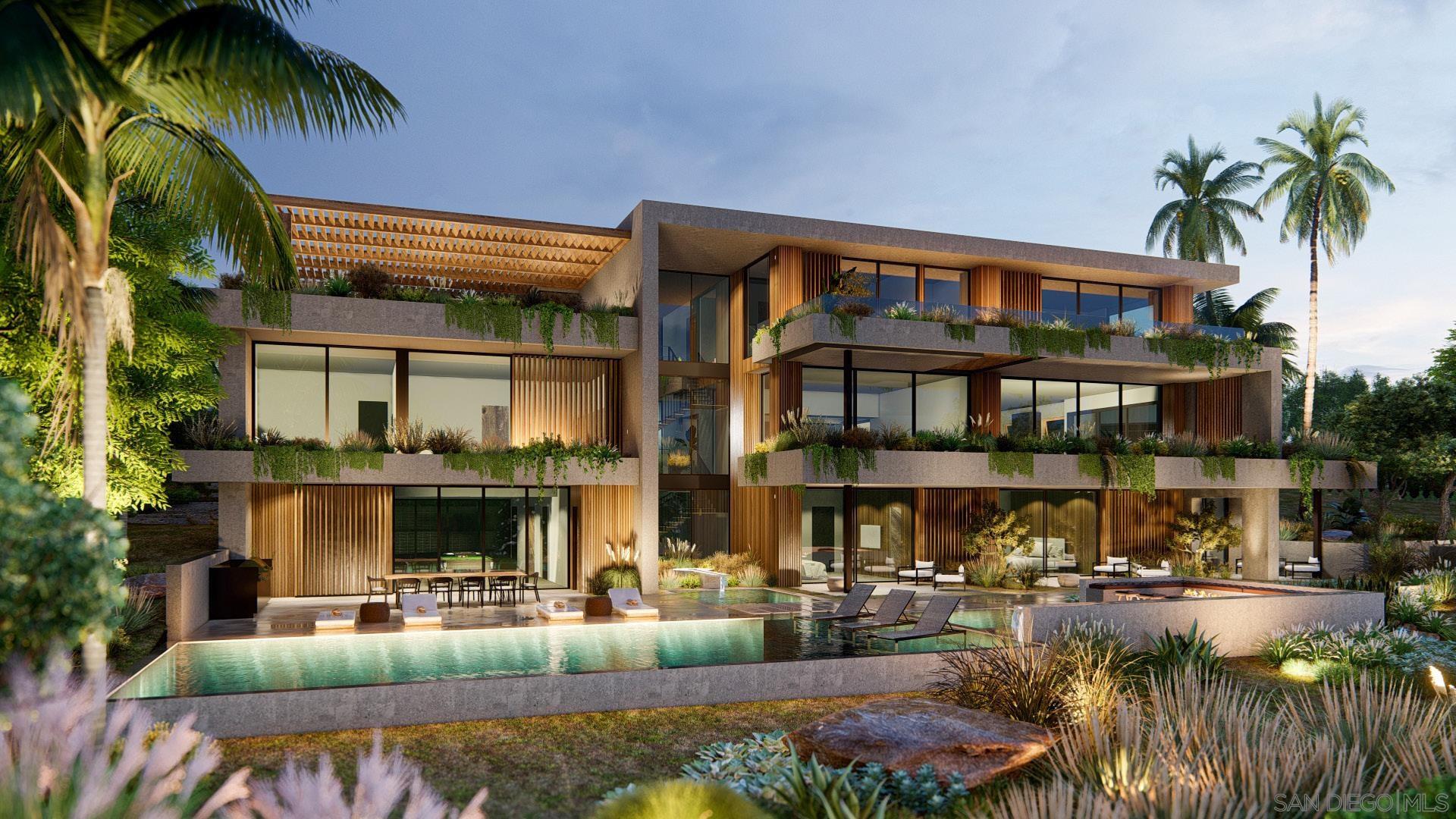 a front view of a house with swimming pool and glass windows