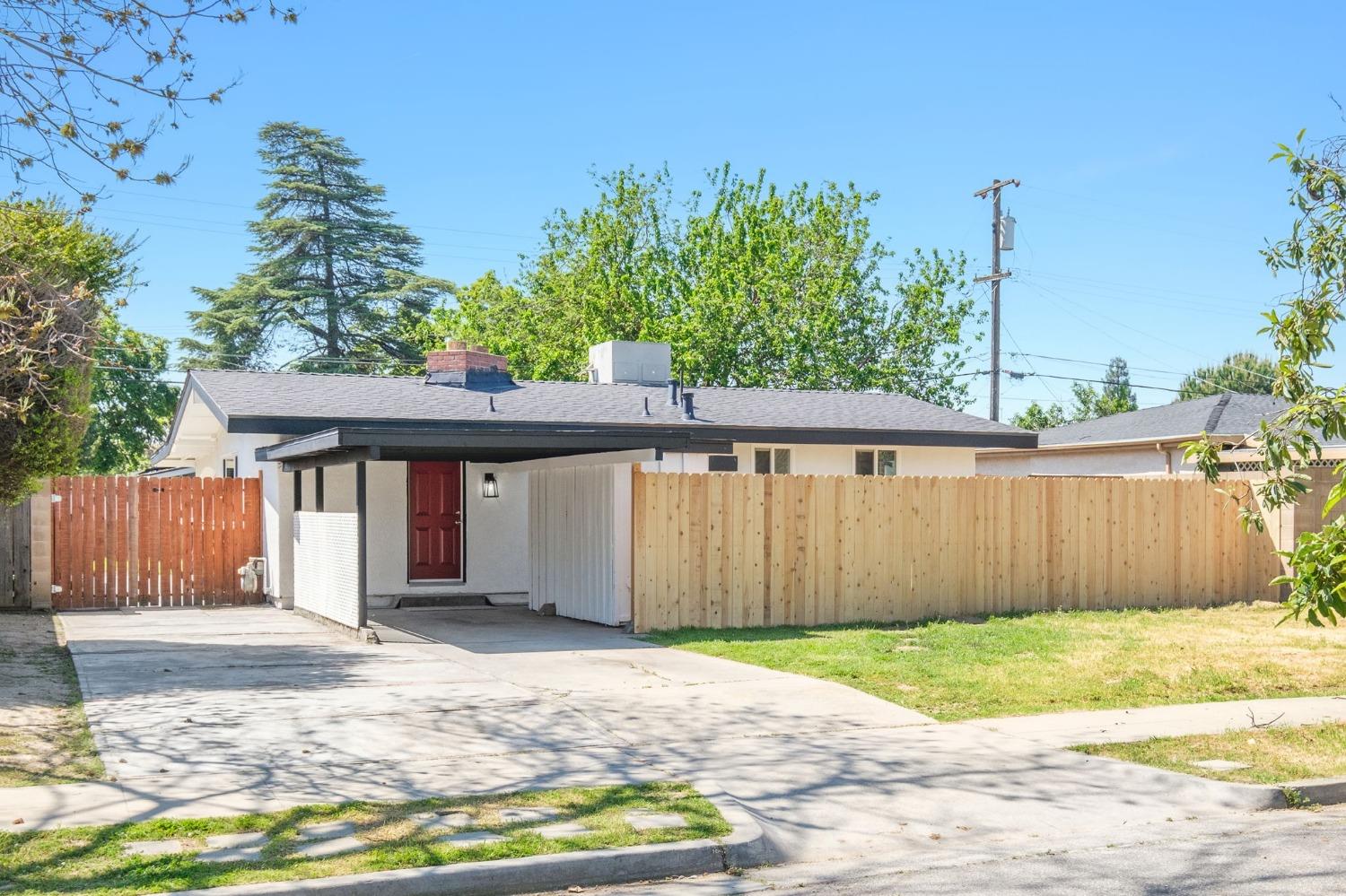 a front view of a house having yard