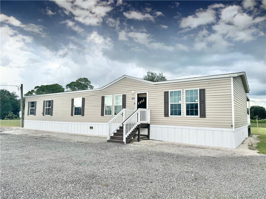 front view of house with a yard