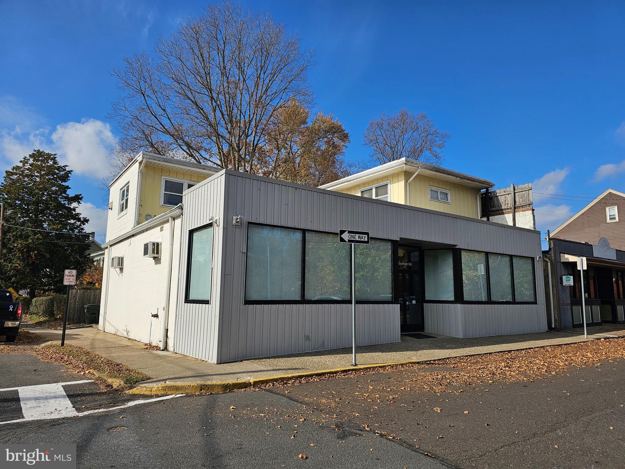 a front view of a house with a garage