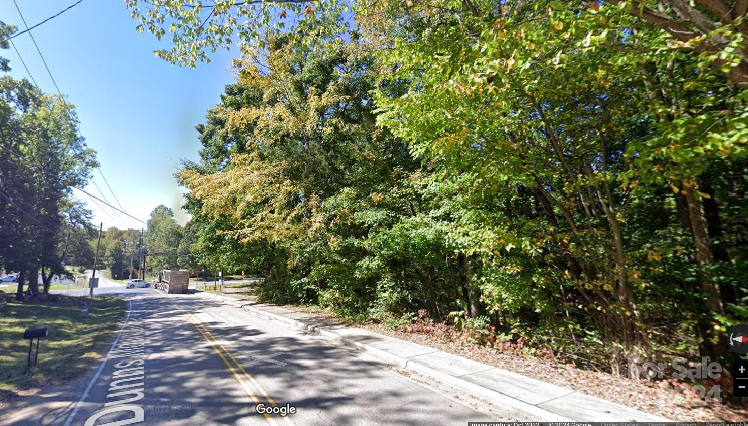 a view of road with trees