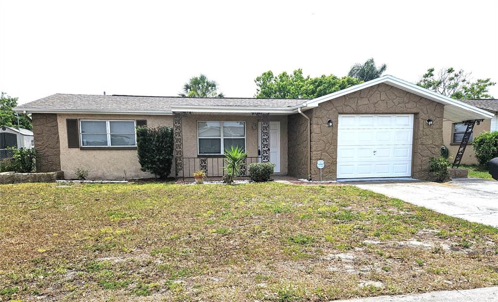 a house with yard in front of it