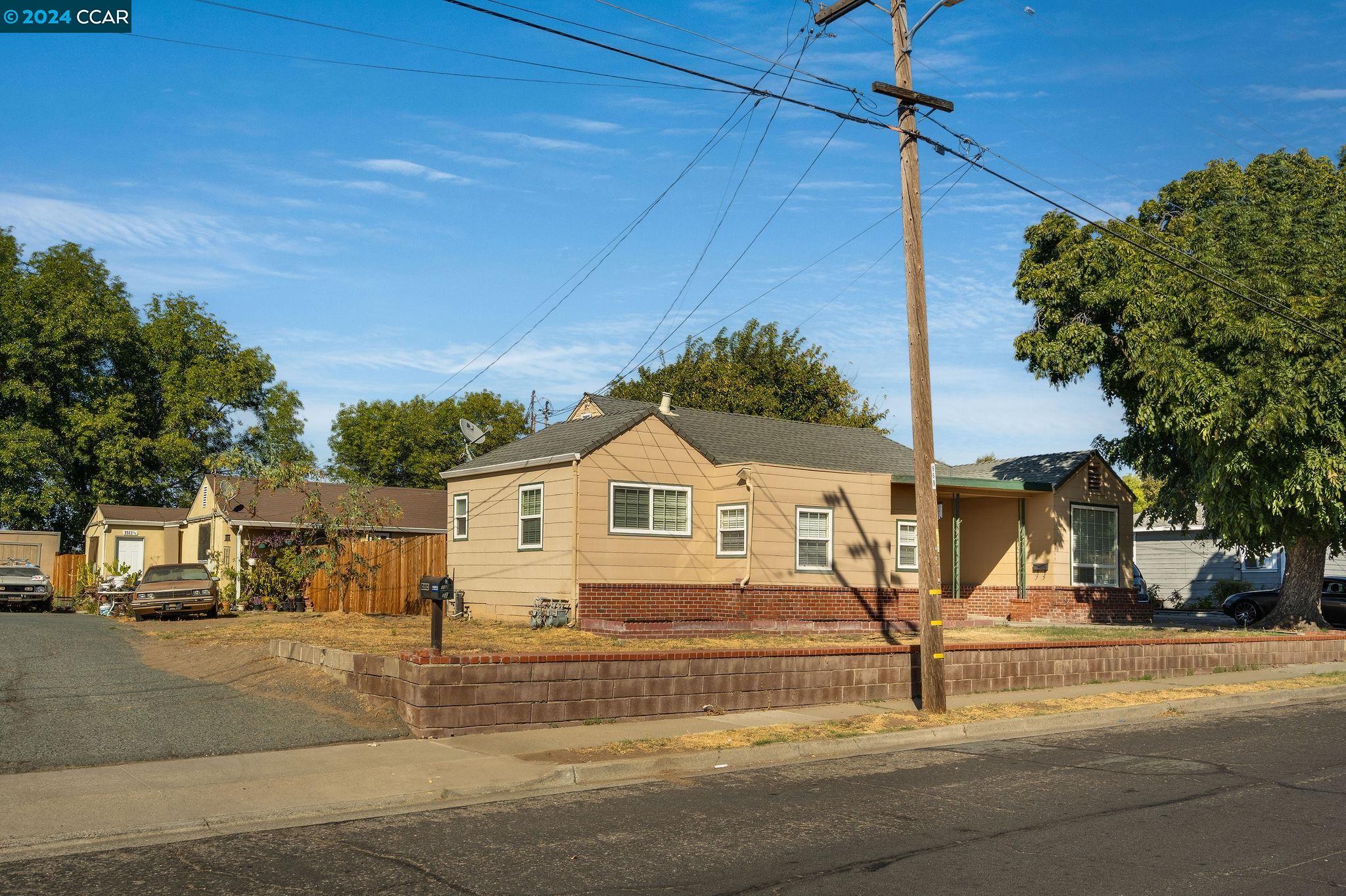 a view of a house with a street