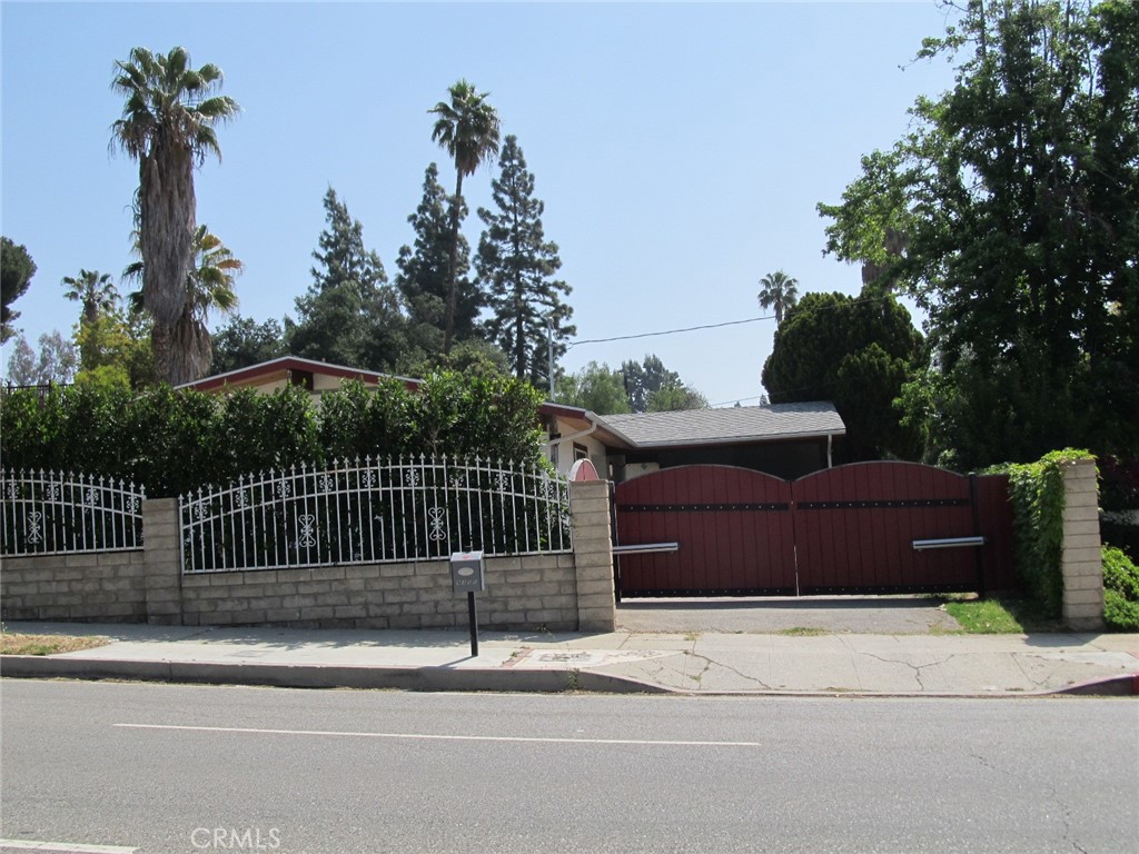 a house view with a garden space