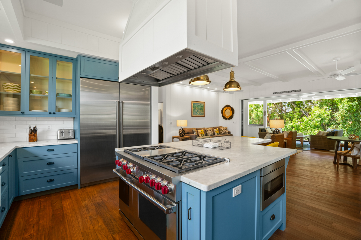 a kitchen with a stove and a refrigerator