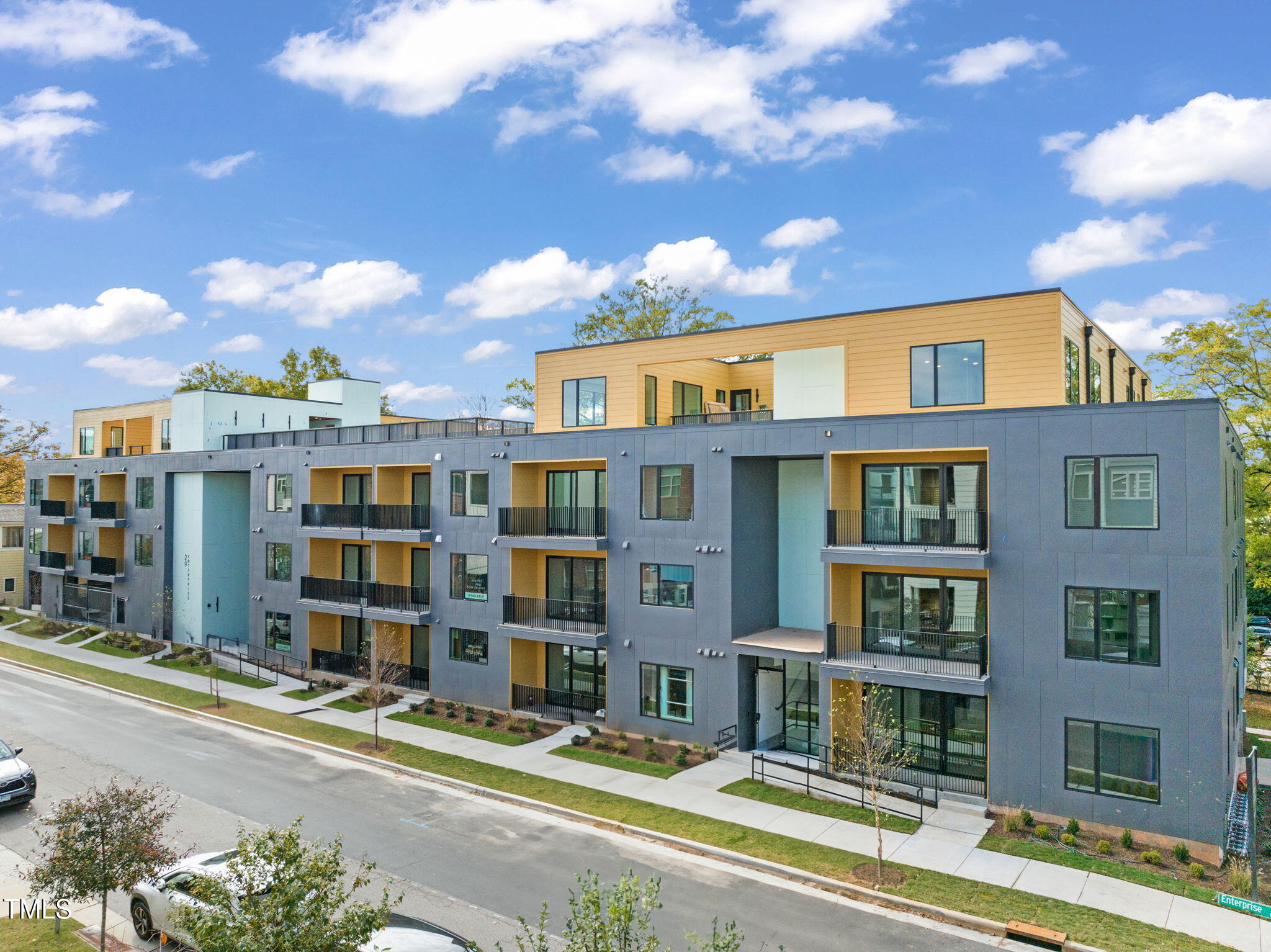 a front view of a multi story residential apartment building