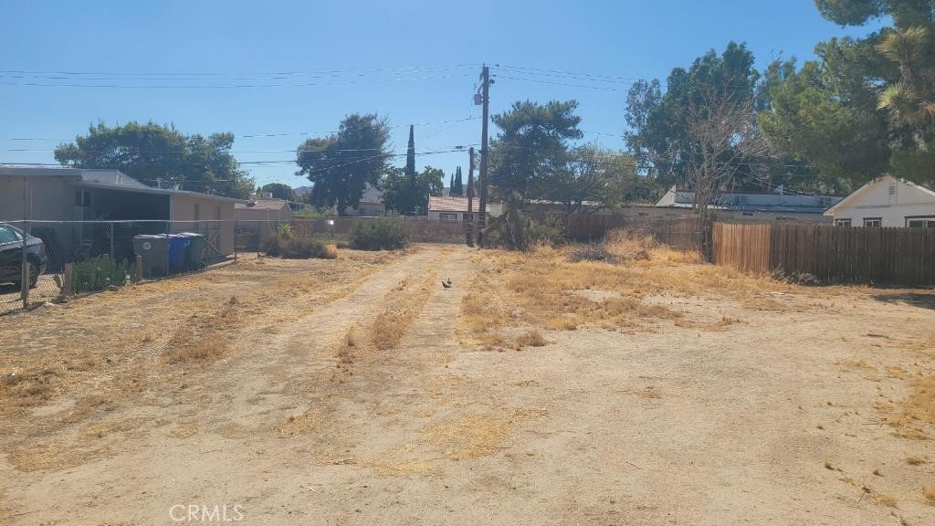 a street view with wooden fence