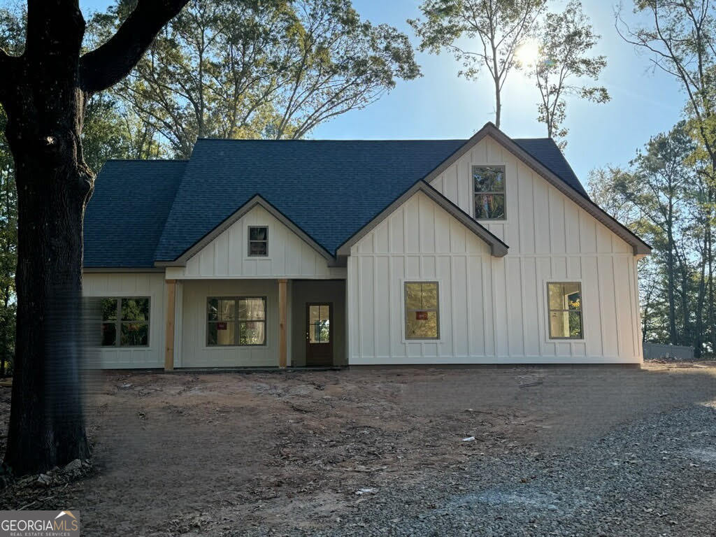 a view of front of house with a garage