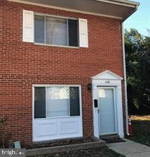 a front view of a house with a door