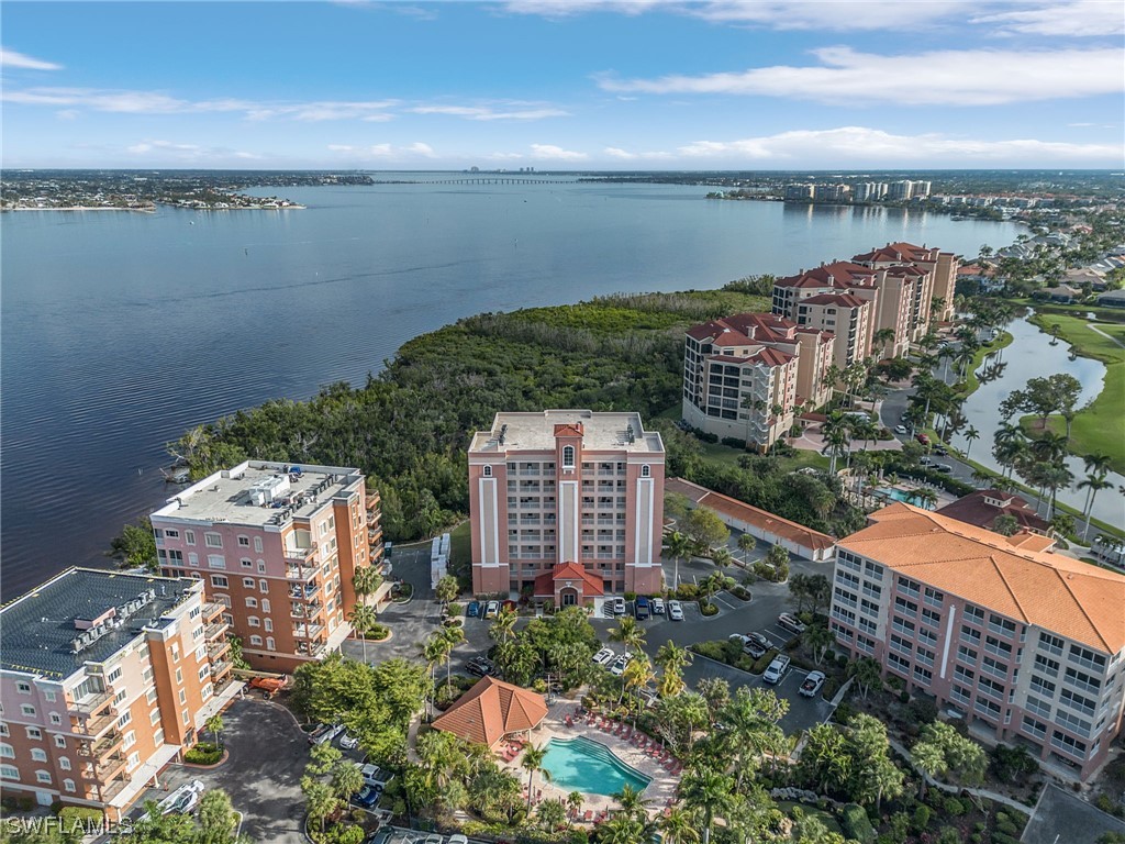 a view of a lake in middle of the city