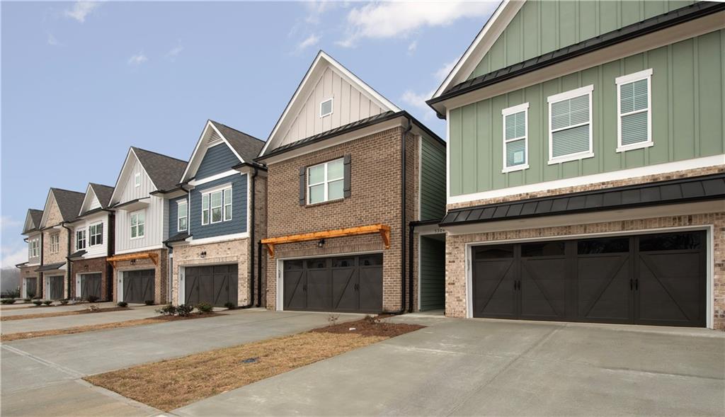 a front view of a house with yard