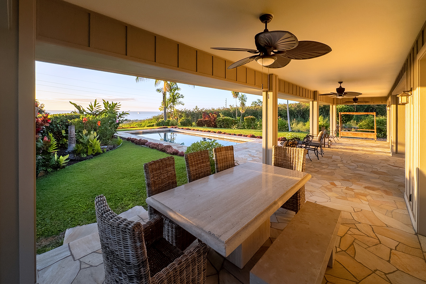 a view of a patio with a table chairs and a patio