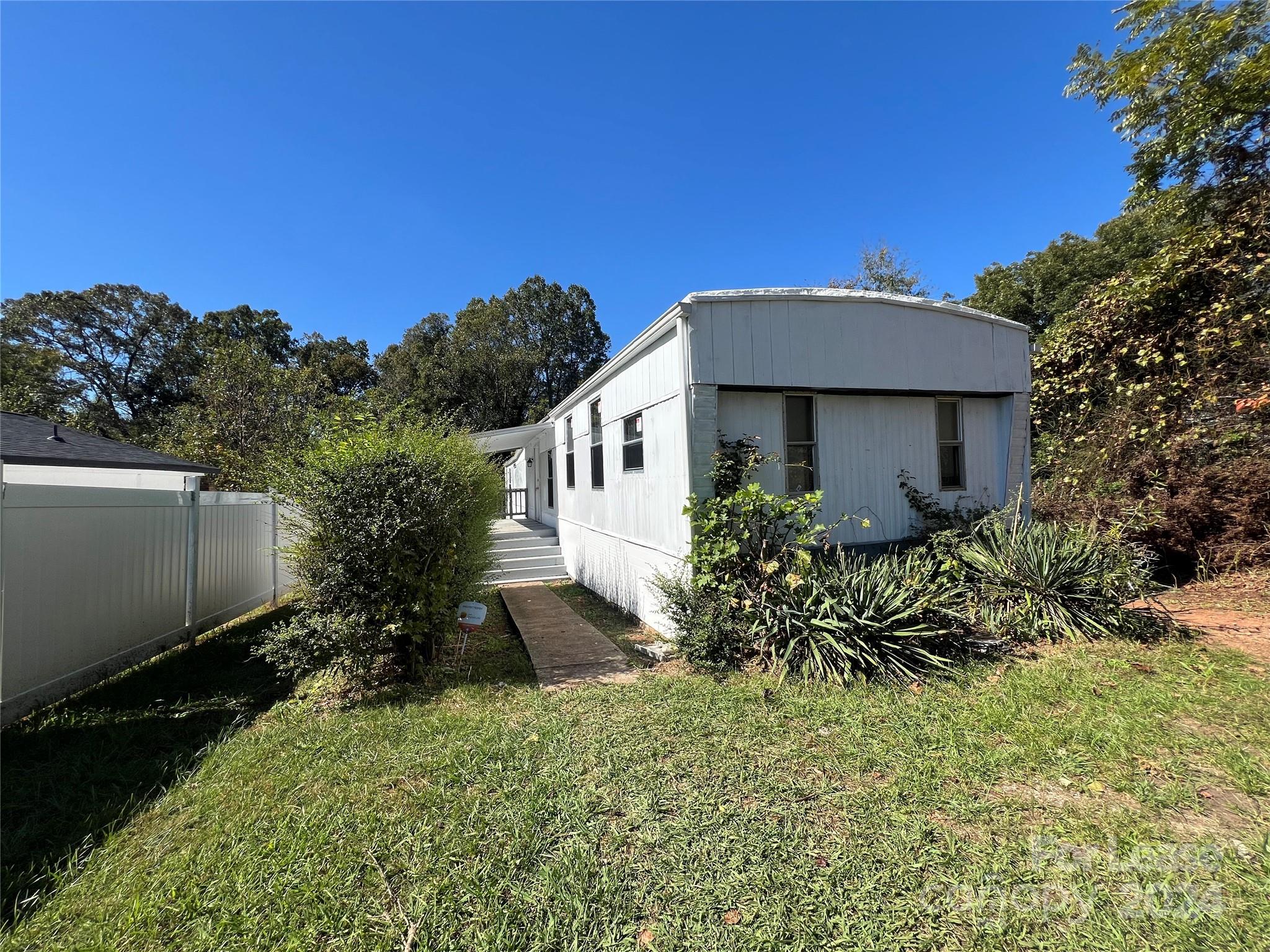 a house view with a garden space