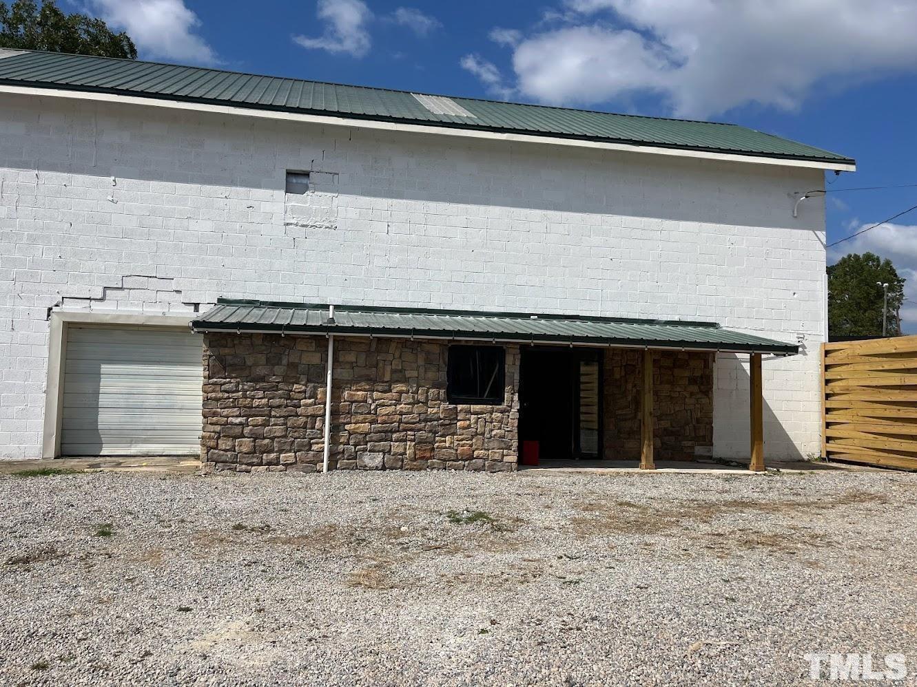 a view of a house with a garage