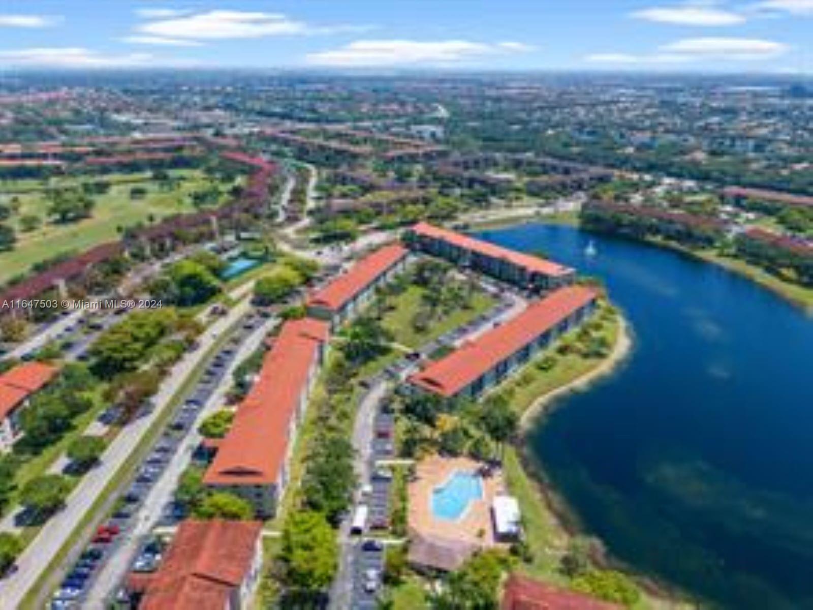 an aerial view of a house swimming pool and outdoor space