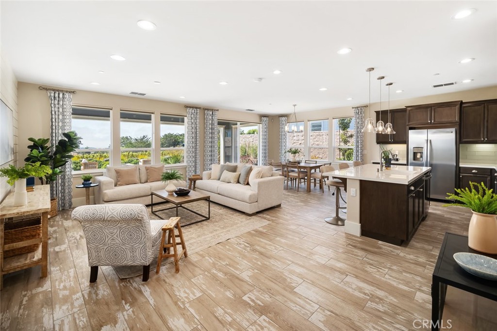 a living room with furniture and a table