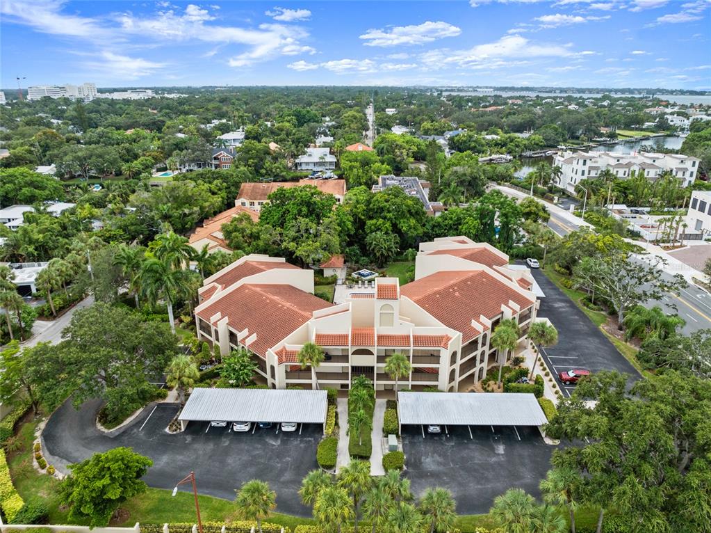 an aerial view of a house with yard swimming pool and outdoor seating