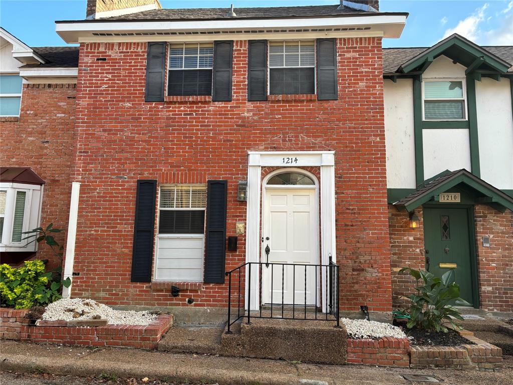 Discover the charm of 1214 Saxony Lane, a picturesque brick townhome beckoning with timeless appeal and a welcoming ambiance.