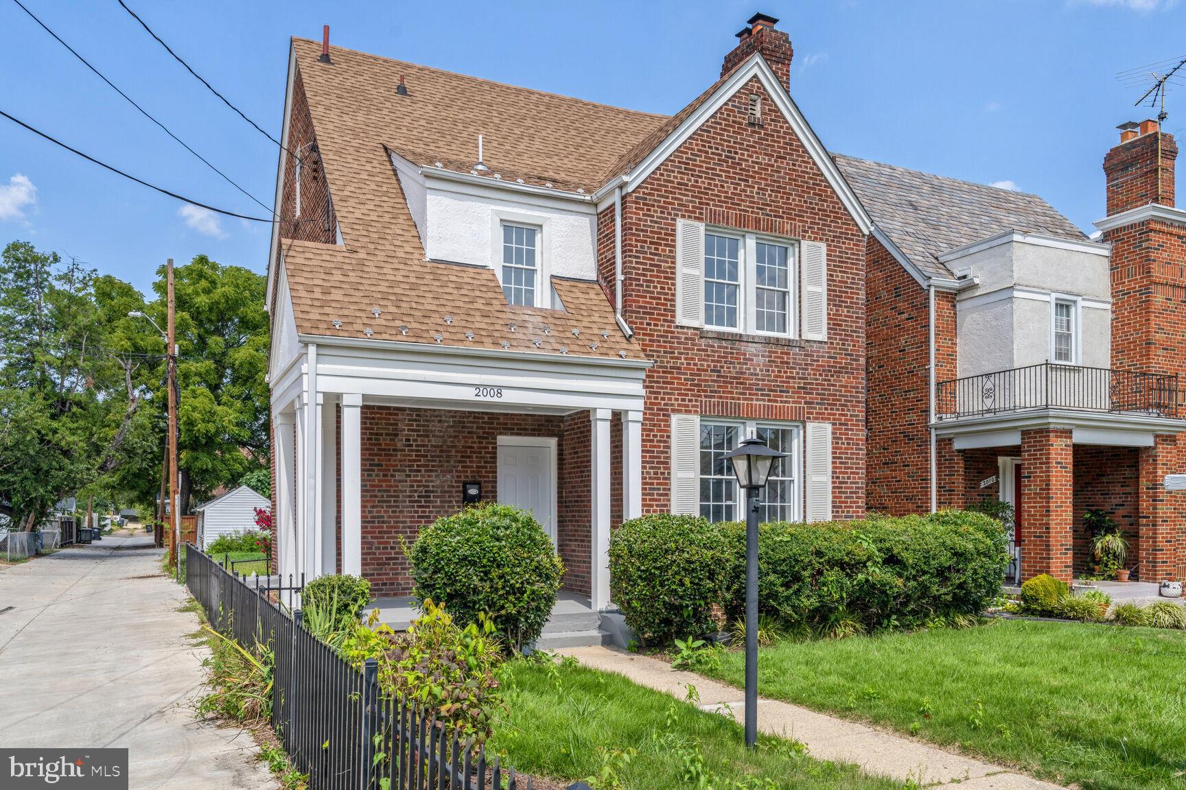 front view of house with a yard