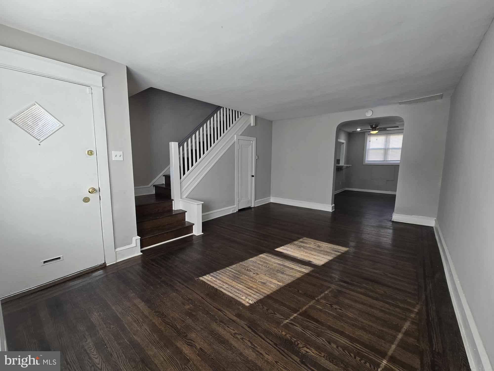 a view of entryway with wooden floor