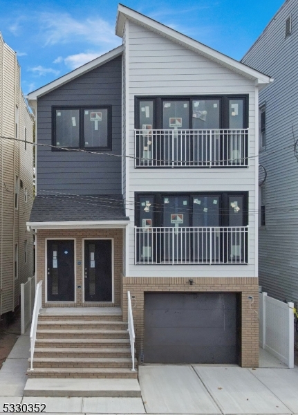 a view of a house with deck and deck