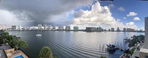 a view of a lake from a balcony