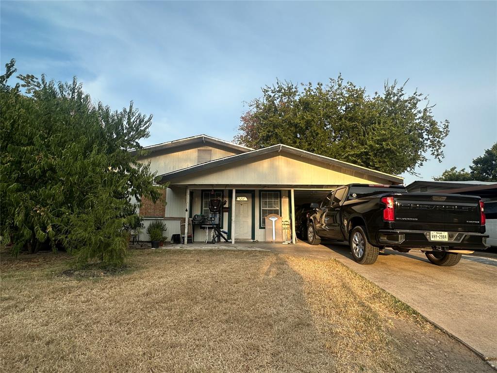 a view of car parked in front of house