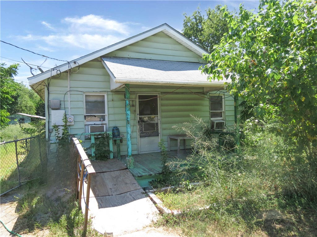 a view of backyard of house