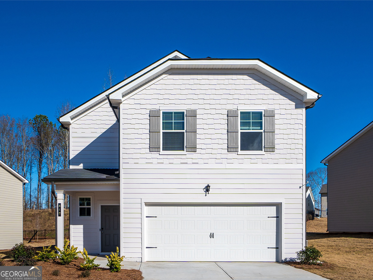 a view of a house with garage