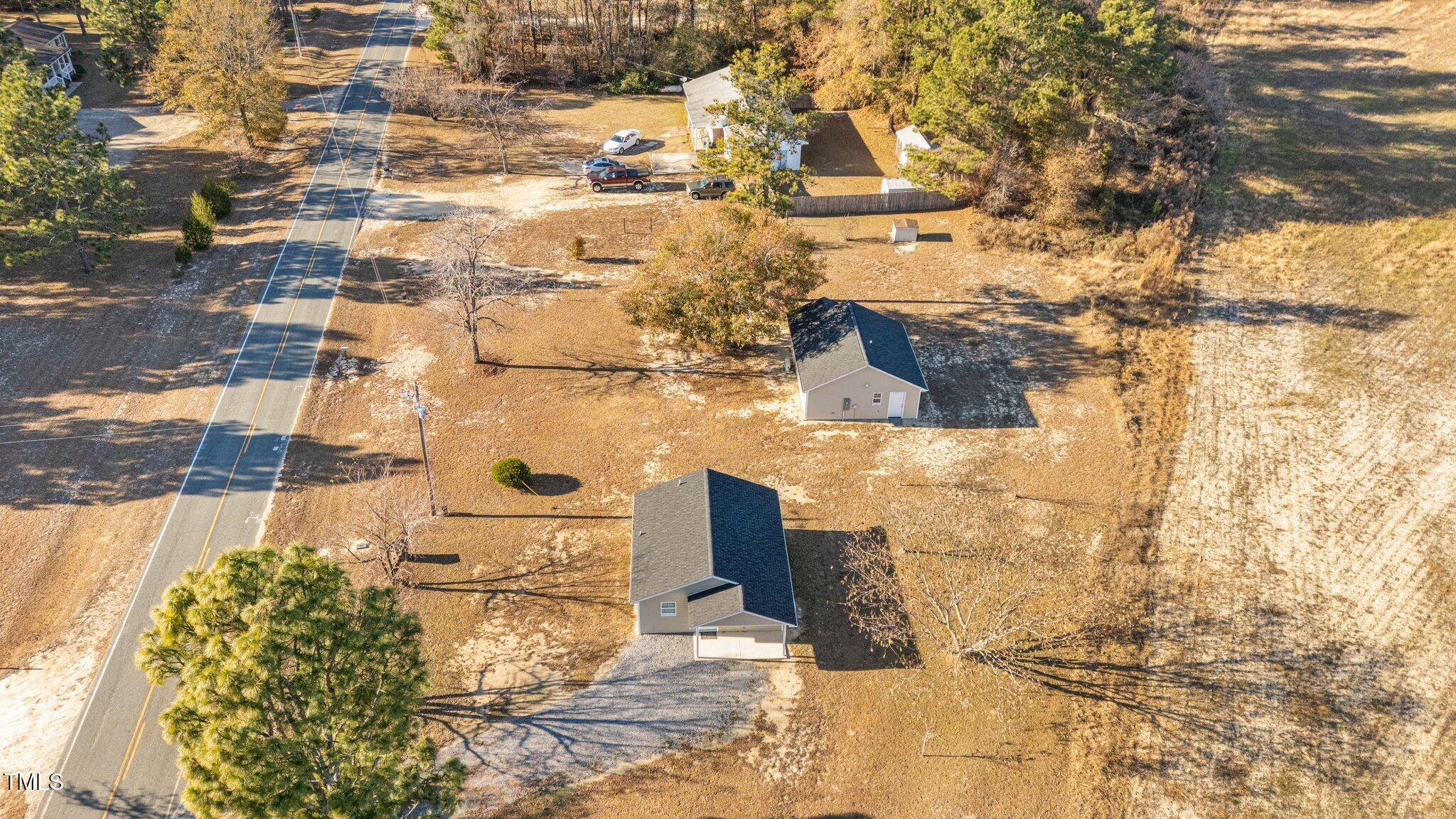 a view of residential houses with outdoor space