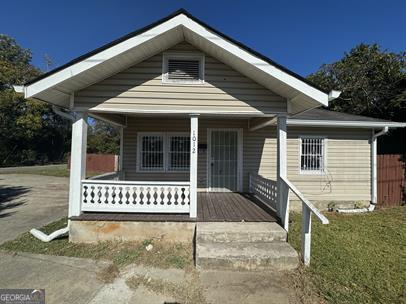 a front view of a house with a garage