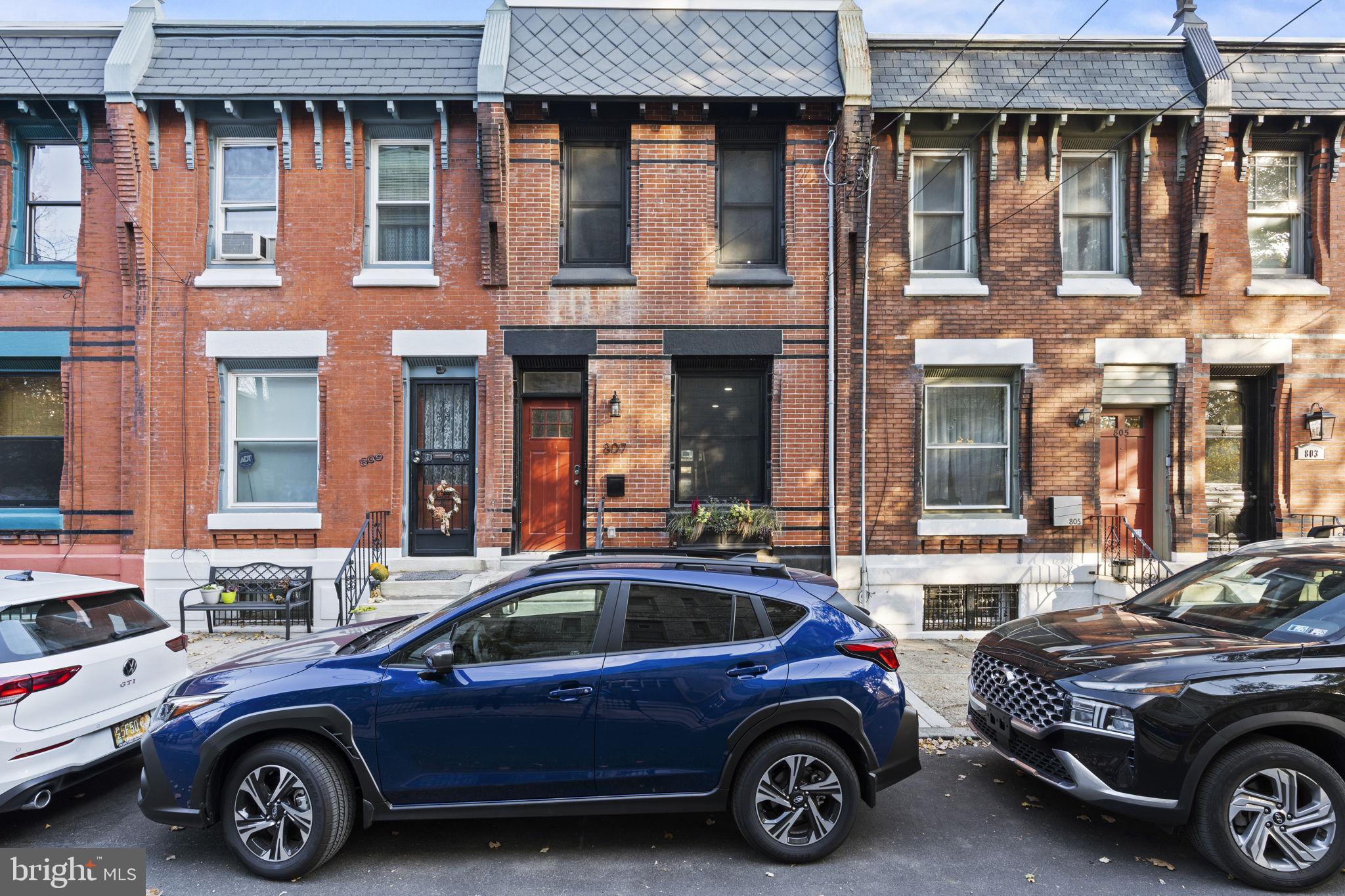 a car parked in front of a building