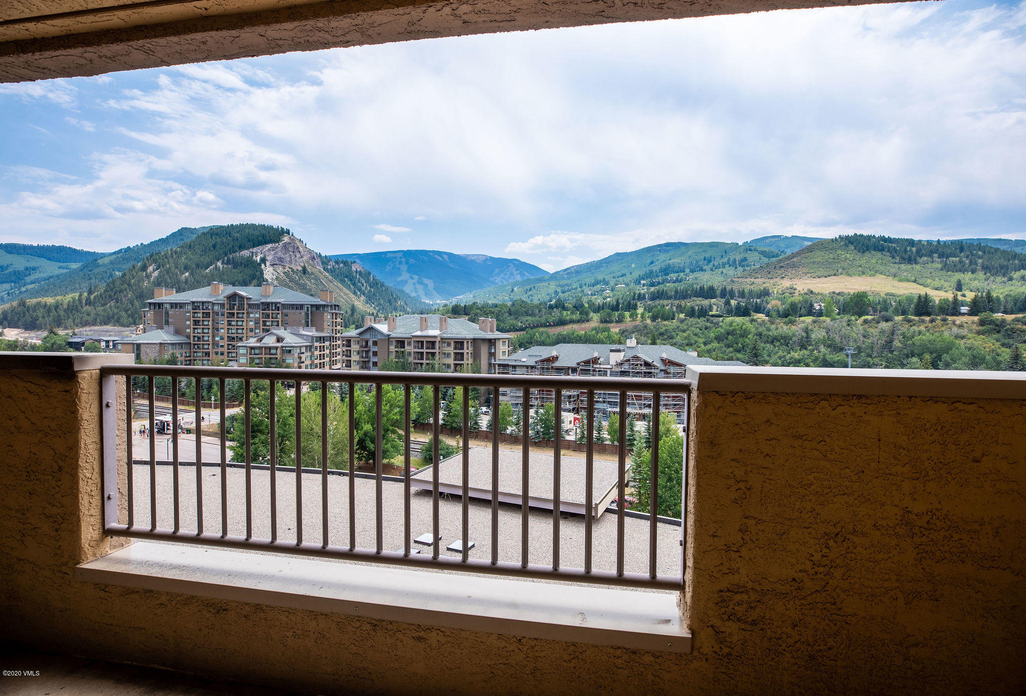 a view of a city from a balcony