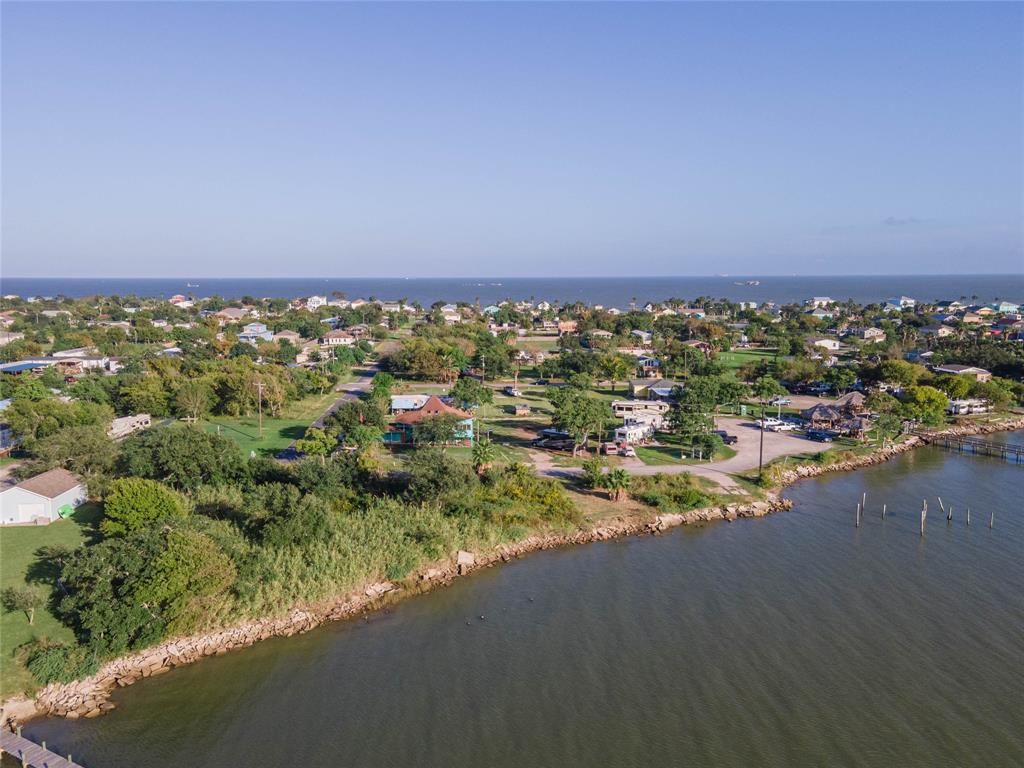 an aerial view of a residential houses and city street