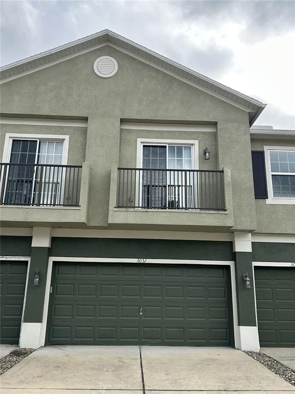 a front view of a house with a balcony